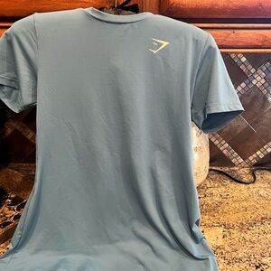 BlLUE GYMSHARK WORKOUT T SHIRT